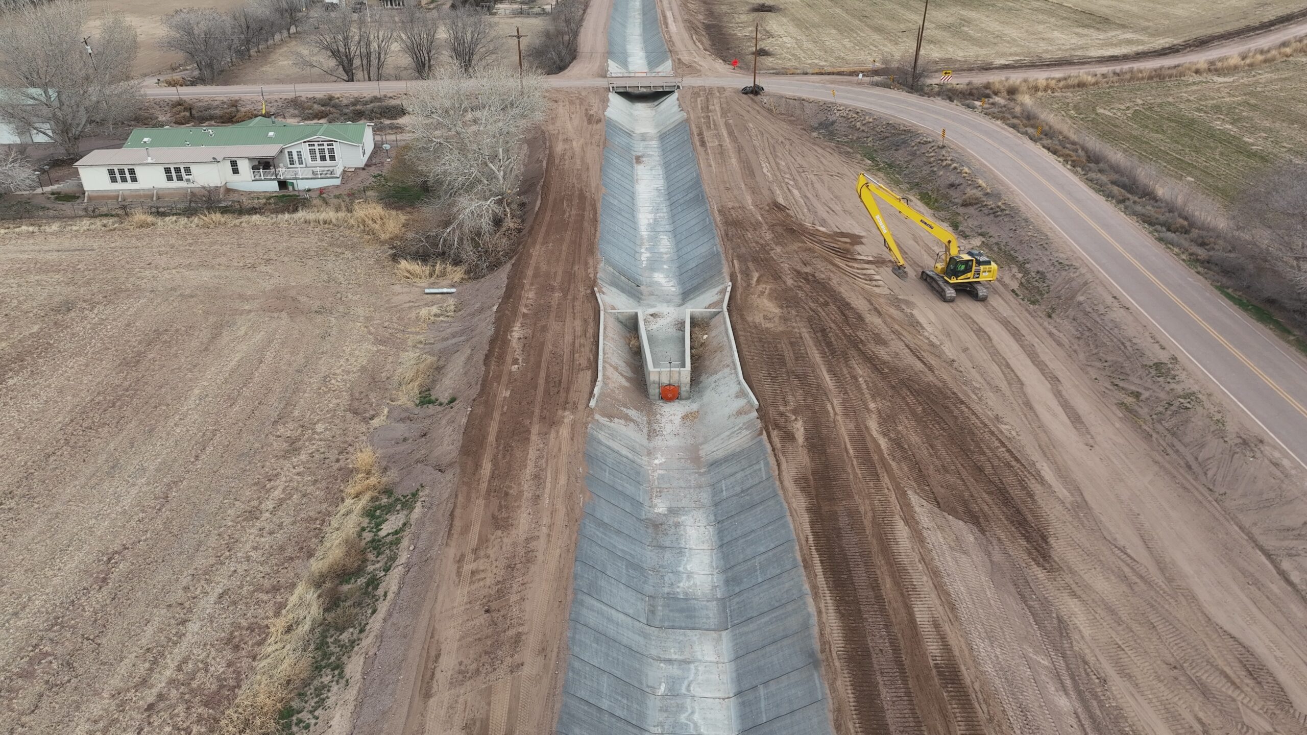 Corrales Siphon Project - Casing install augering Workers drilling a tunnel for the Corrales Siphon Replacement Project